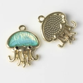 Detail of jellyfish alloy charms with teal enamel front and textured gold back - Gold Base Green