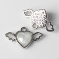 Front and back view of silver alloy heart wings pendant with pearlescent resin inlay - Silver White