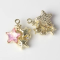 Detailed view of star-shaped alloy pendant with pink resin marble and white rhinestone inlay - Gold Base Pink