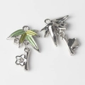 Macro view of bamboo leaf and flower pendant with enamel glaze and zircon inlay detail - Green Gradient Bamboo Leaf with White Flower / Silver