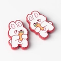 Detail of cute rabbit charms holding carrots for DIY necklace and jewelry making - Red and White