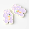 Detail of cute purple and white bunny charms with carrot accents for DIY jewelry making - White Edged Purple