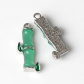 Detailed close-up of bamboo charm with green enamel inlay and star textured metal back - Silver Base Green 2