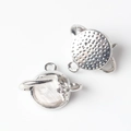 Detailed view of silver planet pendant with resin stone and small star charm for DIY jewelry - White