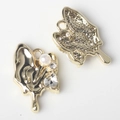 Detailed macro view of gold fluid heart pendants with pearls and zircons for DIY jewelry - Gold / White Zirconia