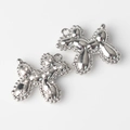 Detailed macro view of balloon dog charms featuring polished silver and zircon pavé settings - Silver / White Zirconia