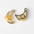 Macro view of gold crescent moon pendants with yellow crystal spheres and top loops - Gold Base Yellow