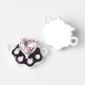 Macro detail of cat paw DIY connectors with pink heart zircon and black enamel finish - Silver White