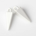 Macro view of matte silver pyramid pendants with metallic paint and round hanging loops - Silver White