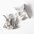 Macro detail of elephant pendant with crystal inlay and star pattern engraving - Silver Clear Rhinestone