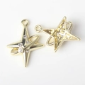 Detailed view of gold star pendant with pearls and zircons for DIY jewelry making - Gold