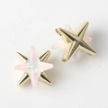 Close-up of double-layered star pendants with gold alloy and pink resin inlay details - Gold Base Pink