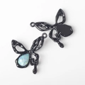 Macro view of butterfly alloy resin pendants with teardrop opal inlays for DIY jewelry - Black Base Blue Stone (WSX-2674)