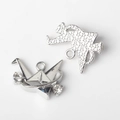 Macro view of silver alloy paper crane and cat pendants with sparkling rhinestones for DIY - Paper Crane Pendant / Silver - White Zirconia