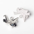 Macro detail of silver paper crane and star-patterned alloy charms for DIY jewelry making - Paper Crane Pendant / Silver-Black