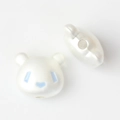 Macro view of cute panda beads with pearlescent finish for DIY jewelry making - Silver White
