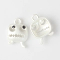Detailed view of matte white ghost pendants with black bead eyes for DIY jewelry making - Silver White