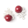 Macro view of silver Xi-character pendants with red pearls and diamonds for DIY jewelry - Double Happiness Style / Silver Base Red