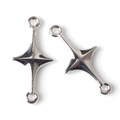 Close-up of silver-plated cross star metal charms with dual loops for jewelry making - Silver