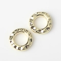 Detail of two hammered gold geometric rings for DIY jewelry making accessories - Gold