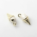 Close-up of gold-plated ice cream pendants with white enamel and heart detail - White (Gold)