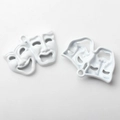 Macro detail of alloy white enamel comedy and tragedy drama mask charms for jewelry DIY - White