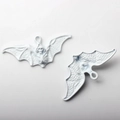 Detailed view of white bat charms with skeleton textures for Halloween jewelry making - Small Bat White