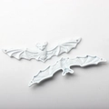 Detailed macro view of white bat alloy pendants featuring embossed wing textures and holes - Large Bat White