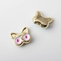 Detail of golden cat-shaped beads with pink accents and holes for DIY jewelry - Gold Pink Zirconia