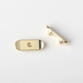 Detailed view of polished gold alloy skateboard charms for DIY jewelry accessories - Gold