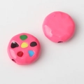 Macro detail of pink alloy beads with colorful dots and glossy finish for DIY jewelry making - Rose Red
