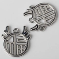 Macro shot of silver alloy antler circle pendant with Fu character for DIY jewelry - Silver
