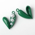 Detail of green enamel pea pod pendant featuring three white faux pearls for DIY jewelry - Green White Pearl