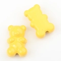 Macro view of glossy yellow gummy bear charm beads for DIY jewelry and accessories - 20 Pieces Set / Lemon Yellow