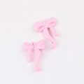 Detalle de colgantes de lazo de esmalte rosa con diamantes para bisutería DIY - Rosa
