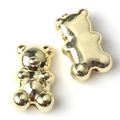 Macro shot of two high-polish golden metal teddy bear charms for DIY jewelry making - 20 Pieces Set / Gold