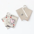 Detailed view of silver playing card charms with a pink heart gemstone for jewelry - Silver / Pink