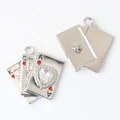 Detailed view of silver poker card charms with heart crystal and mesh back texture - Silver / White Zirconia