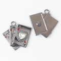 Detail of playing card alloy pendants with heart rhinestone and textured back surface - Gunmetal White Zirconia