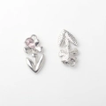 Detailed front and back view of silver alloy flower charm with a pink pear-shaped crystal - Silver / Pink