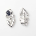 Macro detail of alloy flower charm showing front polished surface and back hammered texture - Silver Base Black Rhinestone