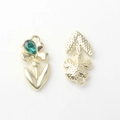 Detailed front and back views of flower charms with green teardrop stones and gold plating - Gold / Green