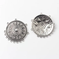 Detail of vintage round alloy connector pendants with geometric mandala sunburst patterns - Antique Silver