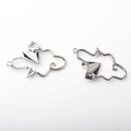 Detail view of silver cloud and paper plane charms with a purple gem for DIY jewelry - Silver/Purple Rhinestone