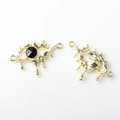 Detail of gold alloy evil eye pendant with black crystal and unique fluid drop design - Eye Shape (WSX-1642) / Gold Black Rhinestone
