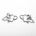 Detailed close-up of alloy cloud and paper plane jewelry charms with zircon inlay - Gunmetal/White Rhinestone
