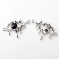 Macro detail of liquid metal silver eye pendant with faceted black gemstone insert - Eye Shape (WSX-1642) / Silver Black Rhinestone