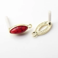 Detailed view of red marquise stone pendants with ornate golden metal backing for DIY - Dark Red (Textured)
