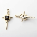 Detail of vintage golden cross pendant with textured finish and black gemstone inlay - Gold Base Black Zirconia