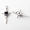 Macro detail of alloy cross pendants with hammered texture and black center stones - Silver Base Black Zirconia